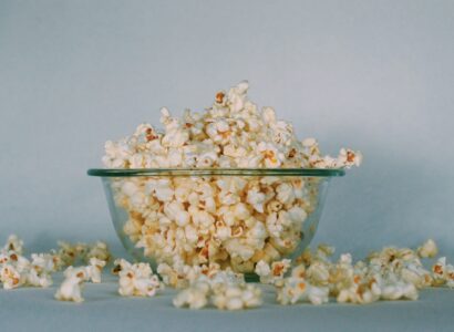 Overflowing bowl of popcorn.