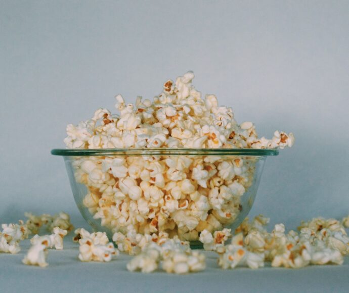 Overflowing bowl of popcorn.