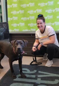 Meredith with her new adopted puppy at the Humane Society