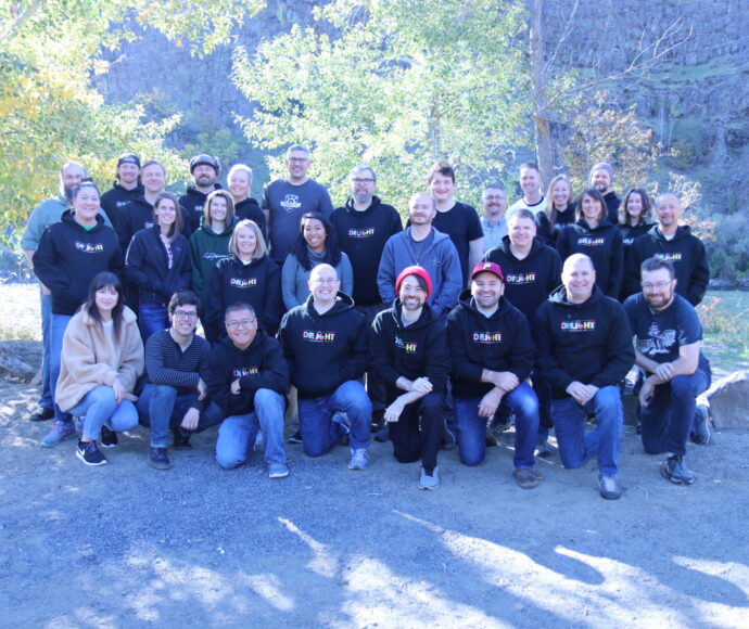 SiteCrafting team group photo in front of the Yakima river.