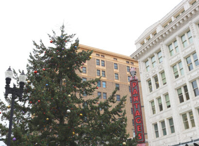 Large decorated Christmas tree outside of Tacoma's historic Pantages Theater.