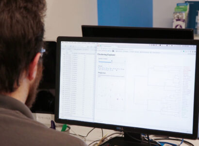 Joe Izenman working at a workstation.