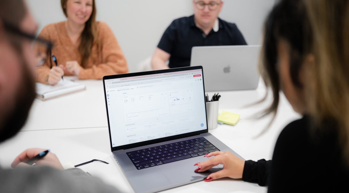 Working together in a conference room.