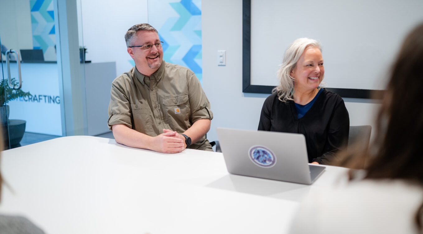 Project managers smiling.