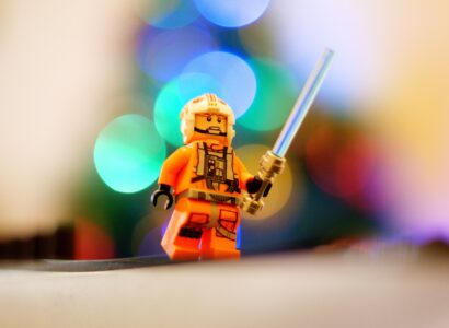 Luke Skywalker Lego character holding lightsaber