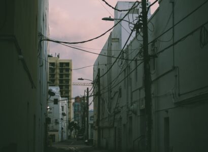 City alley covered with telephone poles and wires