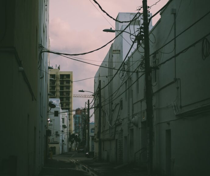 City alley covered with telephone poles and wires