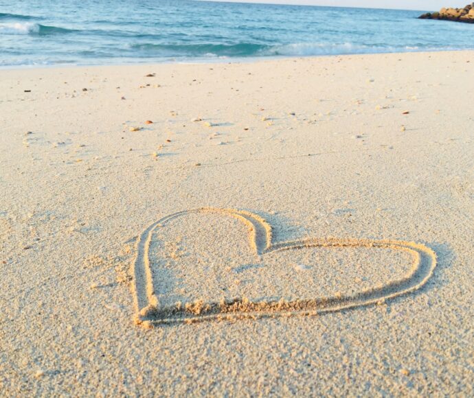 heart drawn in the sand