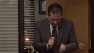 GIF of Michael Scott from the Office doing a drumroll