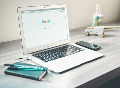 Laptop with google search on the screen.