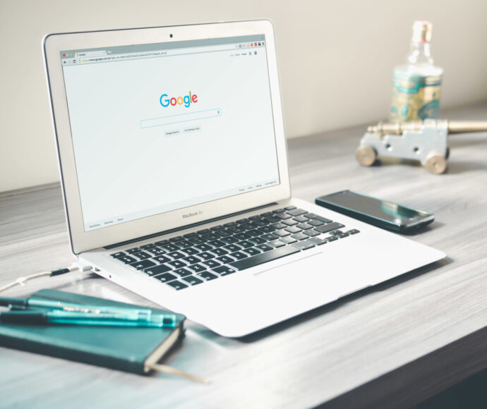 Laptop with google search on the screen.