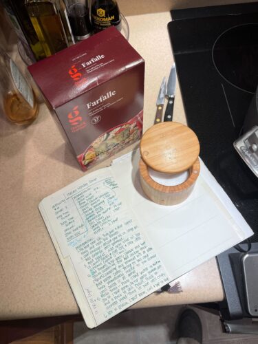 Angie's kitchen counter with cooking ingredients and recipe